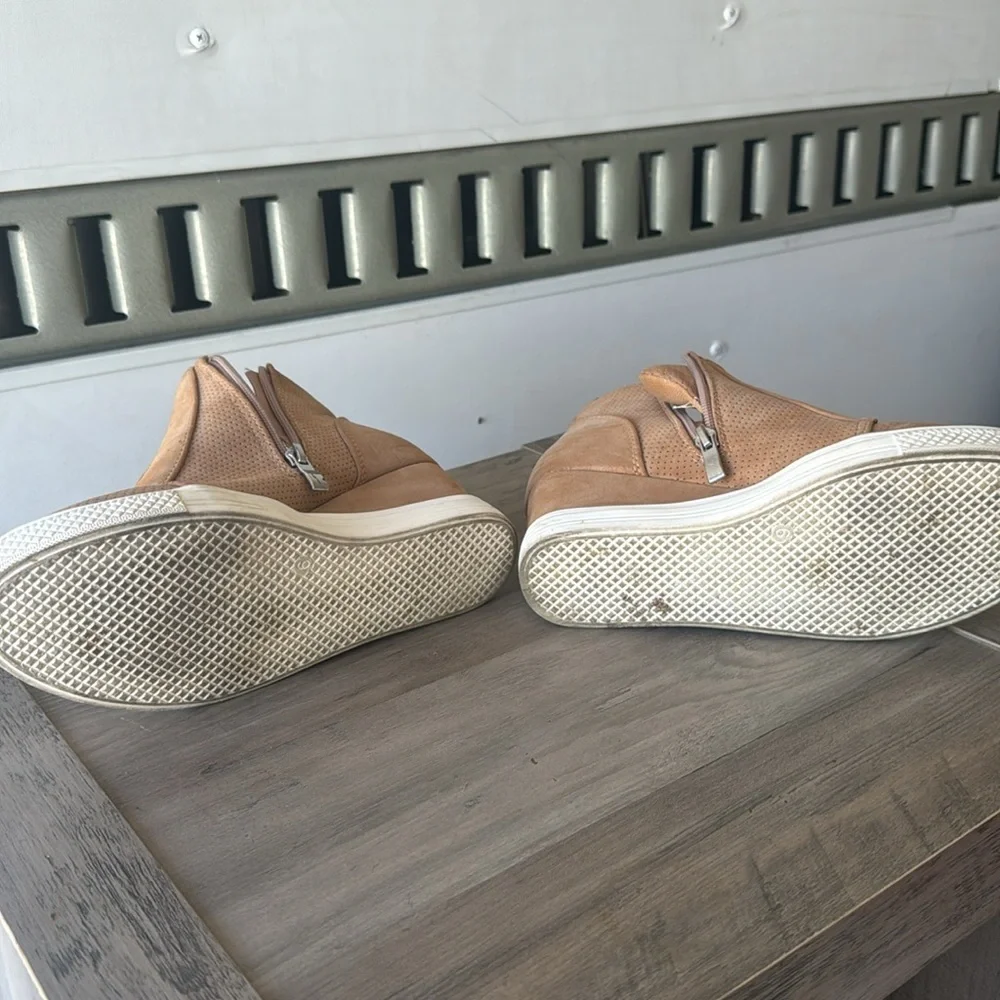 Tan high top shoes